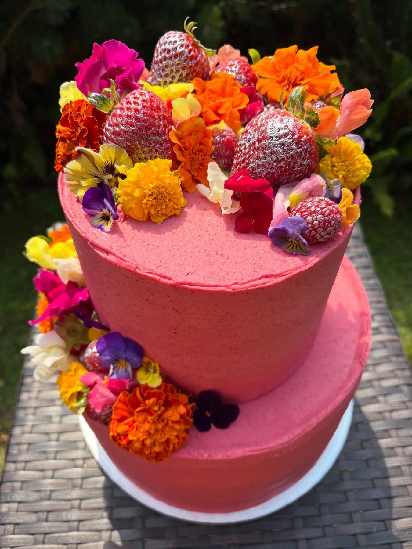 Rach finishing a custom layer cake